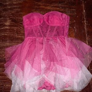 Pink sparkly strapless dress with corset boning in front and lace up in the back
